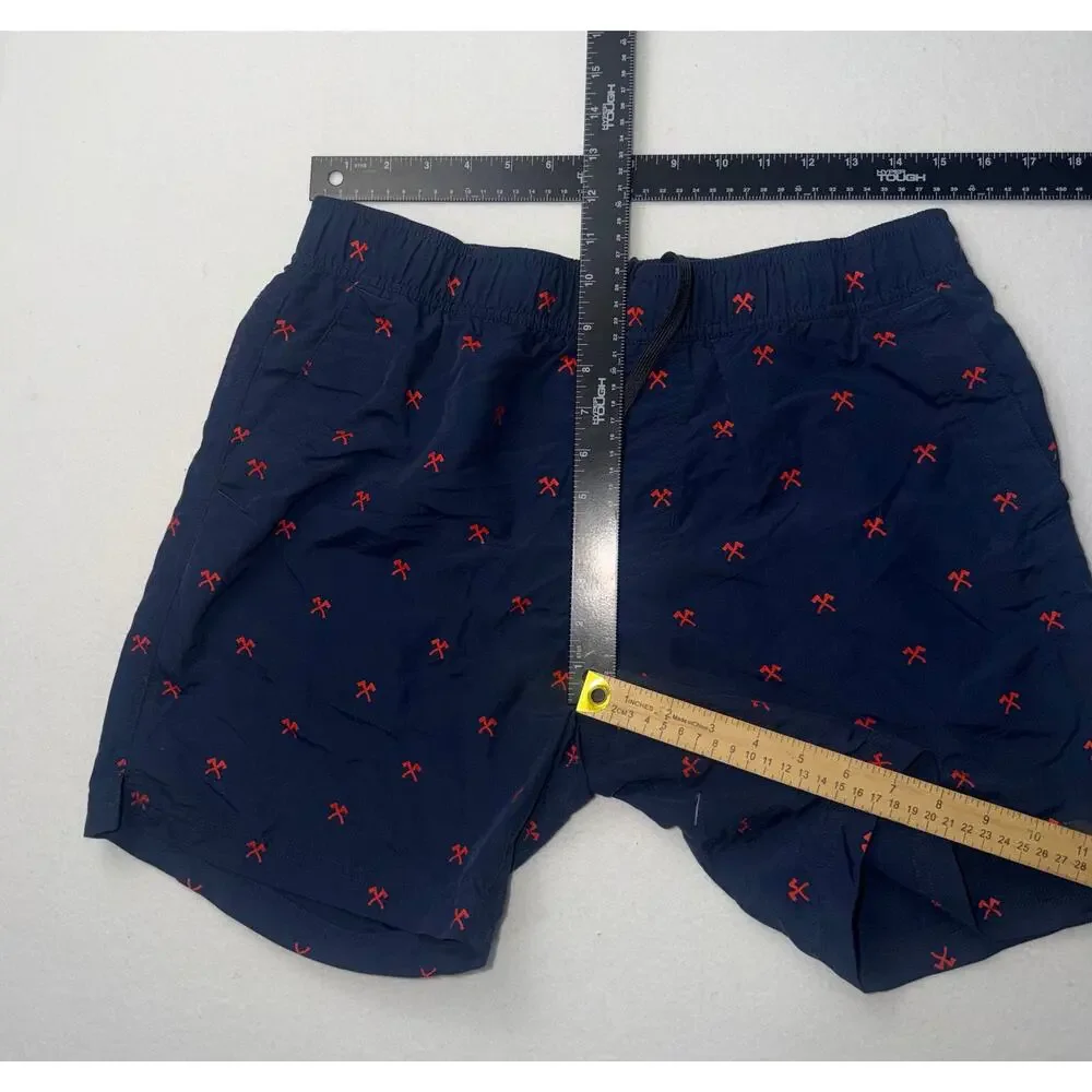 The north face men’s navy & red swimming trunks